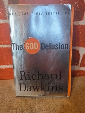 ✝️ ✨️The God Delusion (463 Pages) by Richard Dawkins - Silver Color Paperback ✝️